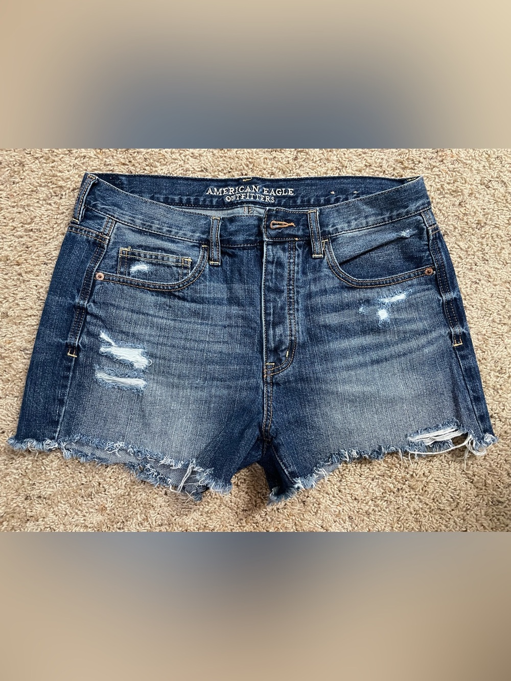 Women’s American Eagle blue jean denim destructed cutoff shorts size 10/12 -READ